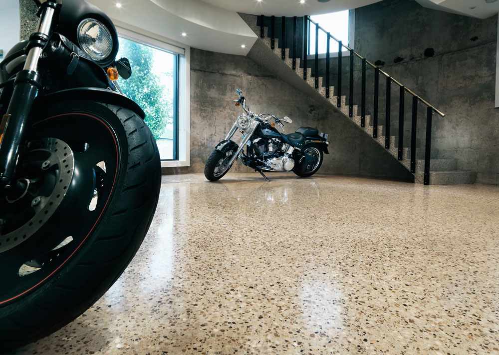 Motorbikes sitting on floor polished with Husqvarna HiPERFLOOR® polishing system